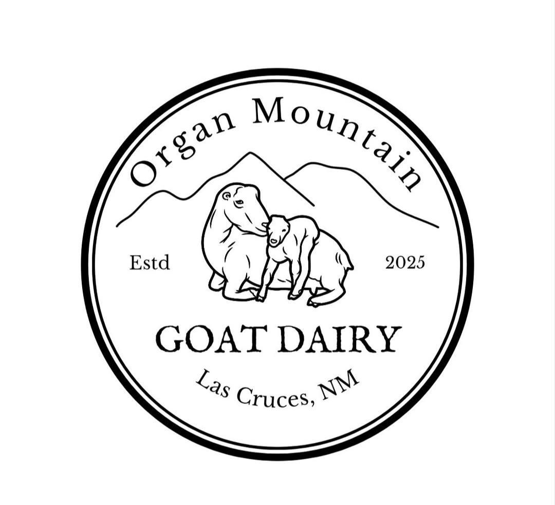 Organ Mountain Goat Dairy official logo — circular badge with mountain silhouette and two goats, Est. 2025, Las Cruces NM